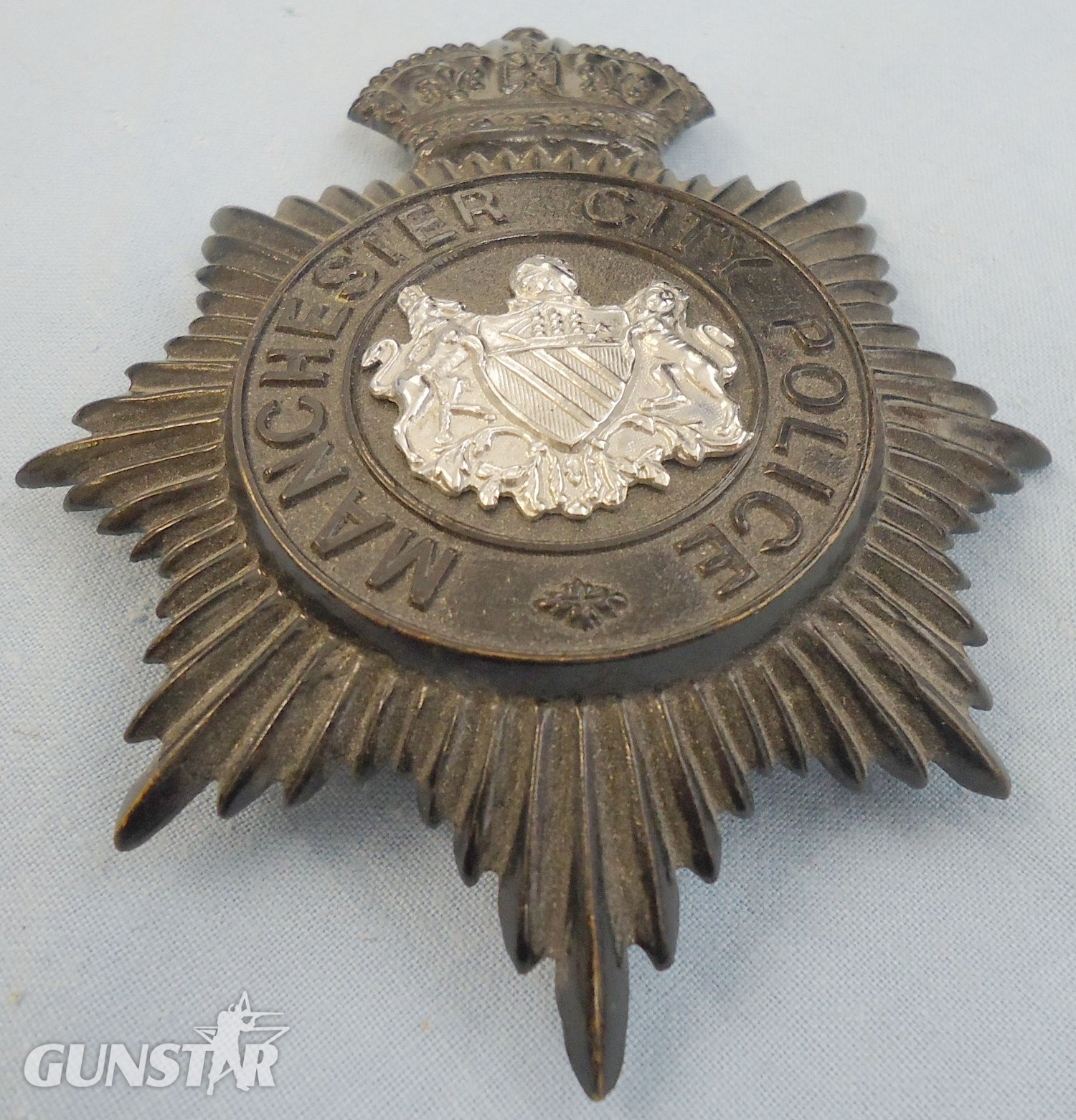 Kings Crown Manchester City Police Blackened Two Piece Helmet Plate. POL 388. Kings Crown Manchester City Police Blackened Two Piece Helmet Plate. POL 388.  Antique & Militaria