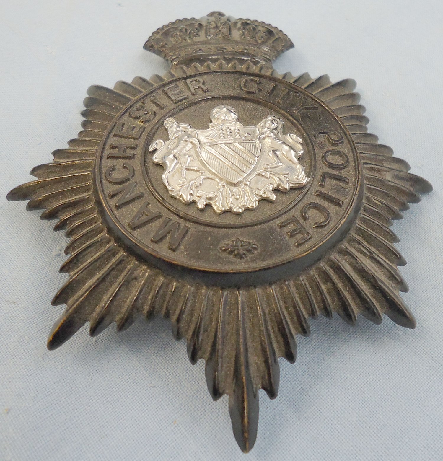 Kings Crown Manchester City Police Blackened Two Piece Helmet Plate. POL 388. Kings Crown Manchester City Police Blackened Two Piece Helmet Plate. POL 388.  Antique & Militaria
