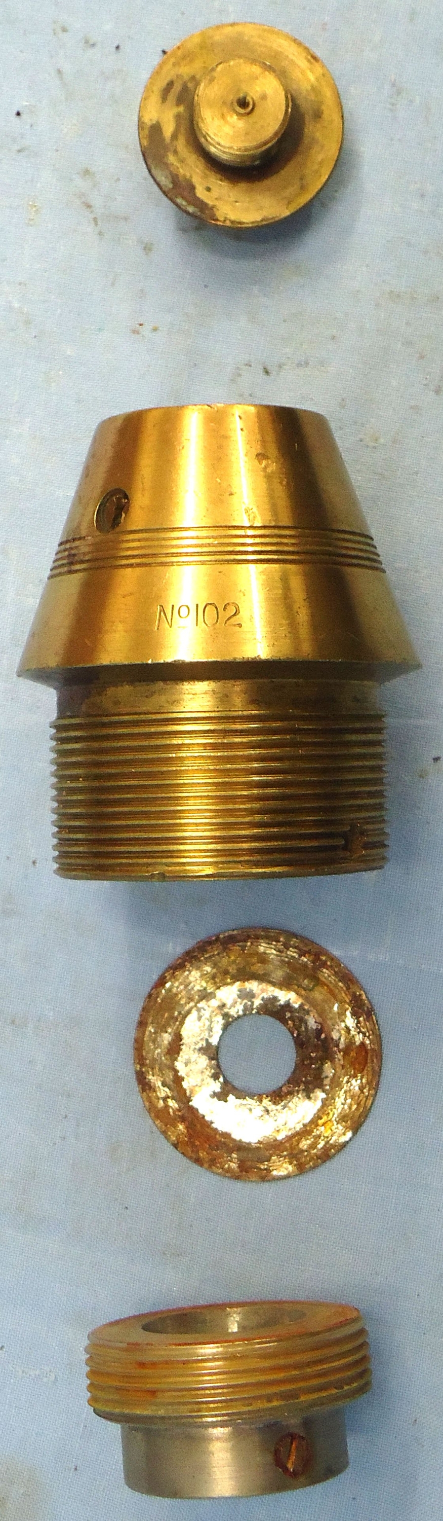  INERT DEACTIVATED. **MINT** Rare, Strippable, British WW1, 1916 Dated, British No 102 Percussion Nose Fuze for High Explosive Rounds with Steel Gaines. - O 2188 INERT DEACTIVATED. **MINT** Rare, Strippable, British WW1, 1916 Dated, British No 102 Percussion Nose Fuze for High Explosive Rounds with Steel Gaines. - O 2188  Other Ammunition