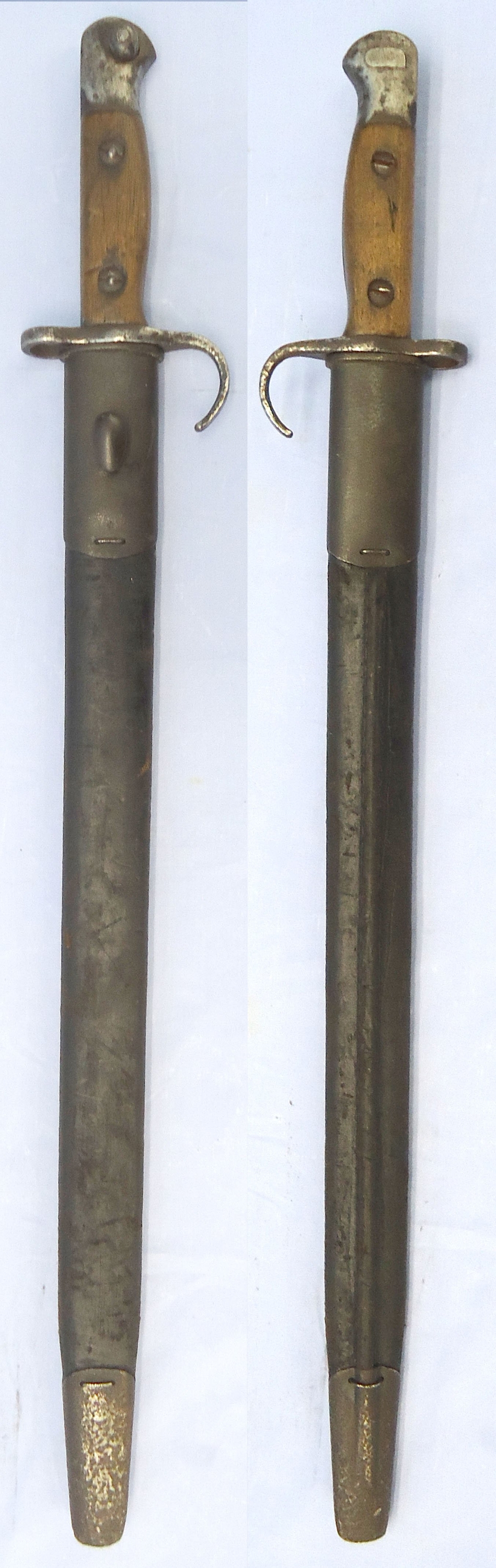 Rare** British P1907 Hooked Quillon and Scabbard Made by J.A. Chapman & Co. Sn 23484:20 - 23484:20 This is a British P1907 bayonet with hooked quillon made by J.A. Chapman & Co (J A Chapman Ltd. manufacturers of American pattern carpenter’s braces, Scot Bayonet