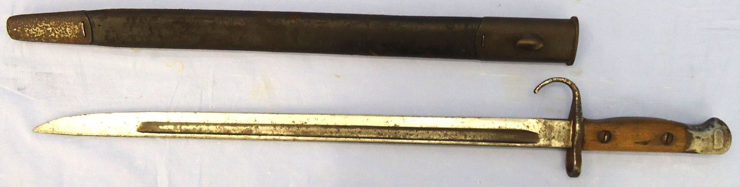 Rare** British P1907 Hooked Quillon and Scabbard Made by J.A. Chapman & Co. Sn 23484:20 - 23484:20 This is a British P1907 bayonet with hooked quillon made by J.A. Chapman & Co (J A Chapman Ltd. manufacturers of American pattern carpenter’s braces, Scot Bayonet - {CATEGORY}
