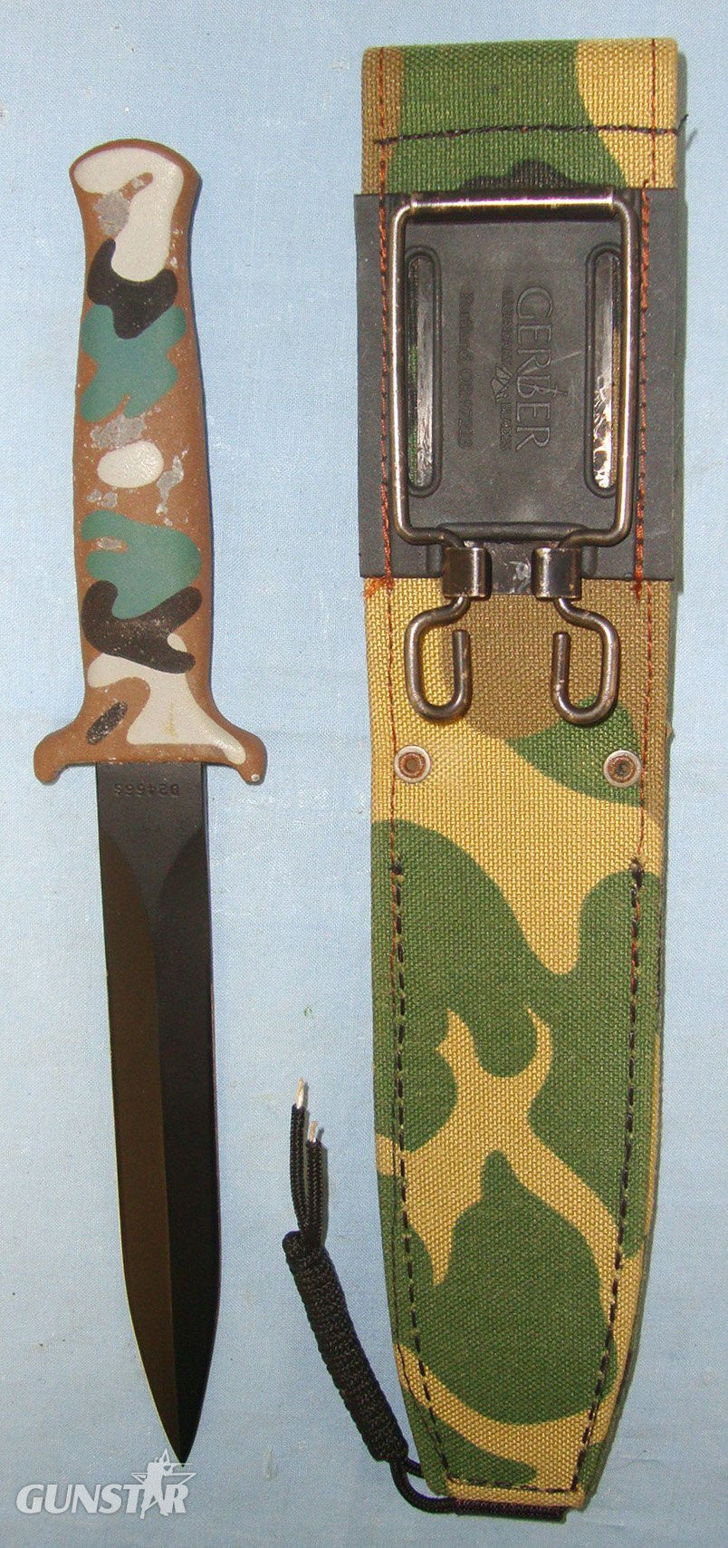  VIETNAM WAR CONNECTIONS**RARE *& DESIRABLE**MINT BLADE**1980’s Variant Gerber Guardian MK II U.S. Military Tactical Combat Fighting Knife With Camouflage Hilt & Scabbard. Sn 23412 Knive