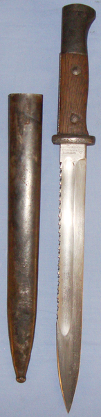  Scarce** German 2nd Type M1884/98 Bayonet with Sawback Blade & Metal Scabbard with Brass Letters on the Grip. BAYO 6290. Bayonet