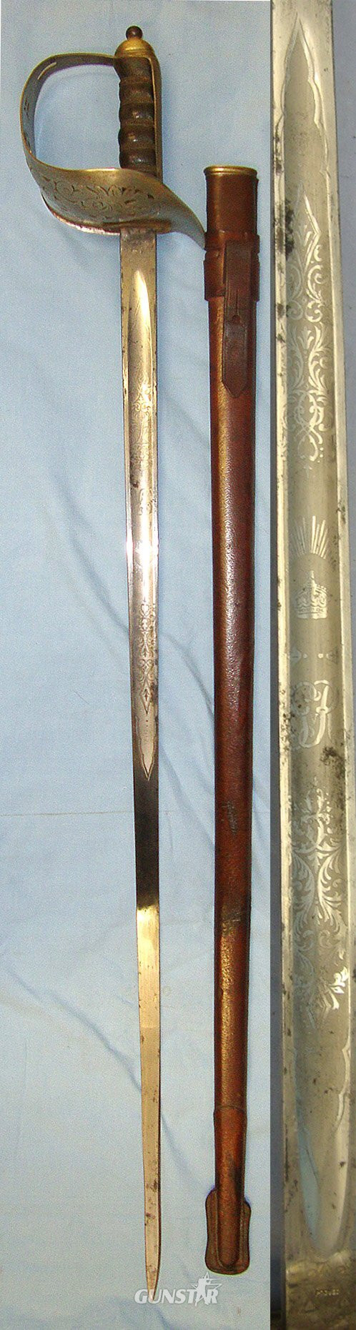 WW1 Era British 1897 Pattern Infantry Officer’s Presentation Sword With King George V Guard Inscribed ‘Presented to Lieut T G Perry by the students of Sir John Deans Grammar School Northwich, Nov 23 1914’ & Leather Covered Field Service Scabbard. ED Sword in 